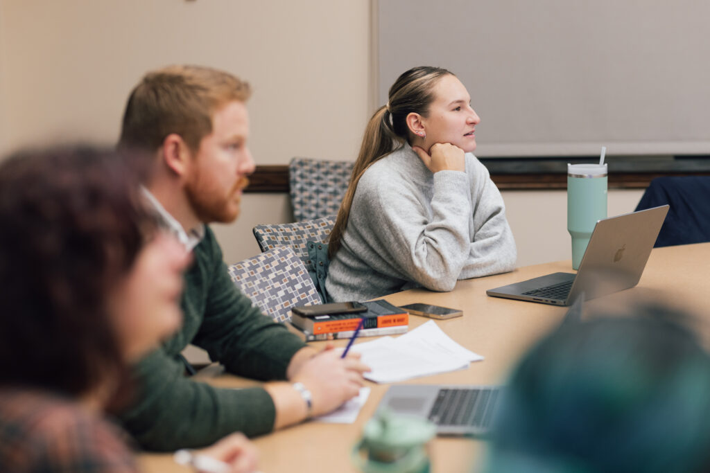 Students learning in a classroom at Providence College.
