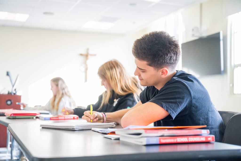 Students in classroom taking notes